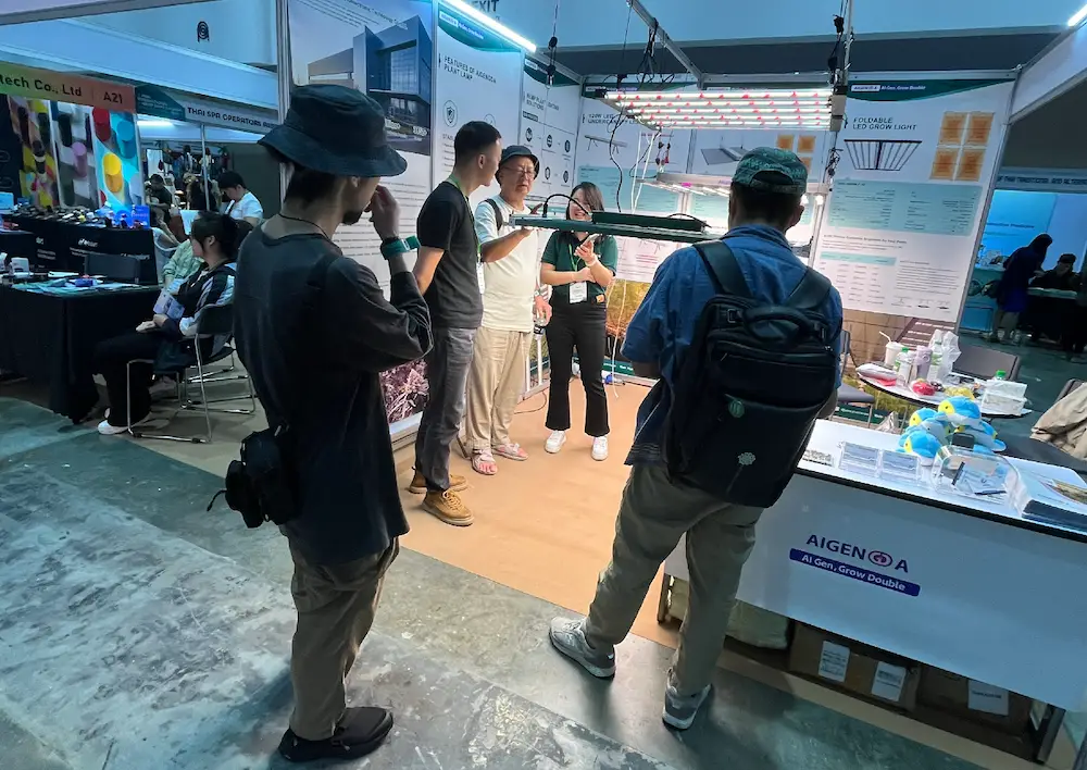 AIGENGDA sales team providing professional business consultation to visitors at Asia International Hemp Expo 2024.